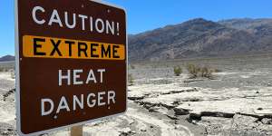 A signboard warning of extreme heat in Death Valley,California.