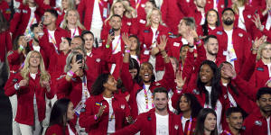 Team England parade during the opening ceremony of the Commonwealth Games in customisable uniforms by Community Clothing.