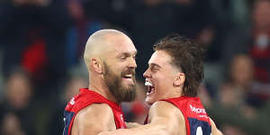 Max Gawn of the Demons is congratulated by Trent Rivers after kicking a goal.
