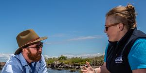 Reporter Liam Mannix beachcombs with marine expert Jacinta Early at Jawbone Marine Sanctuary.