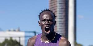 Gout celebrates his national title in the 200m.