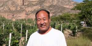 Ma Chaoxiang,47-year-old villager who works for the Baojialong Winery.