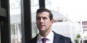 Roberts-Smith punched SAS soldier in jaw and ordered mock execution,court told