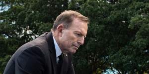 Former prime minister and monarchist Tony Abbott left flowers and paused to read tributes.