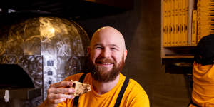 Ribelle chef-owner Dale Mann with a mustard tarragon chicken pie pizza from Ribelle,Freshwater.