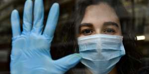 Chemist Amaya Pascual poses for a photograph in her pharmacy in Pamplona,northern Spain.