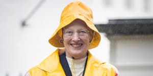 Queen Margrethe in her floral raincoat made from tablecloth material on summer vacation in Grasten,Denmark in July,2017.