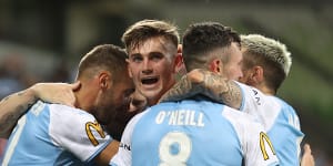 City survive nervous finale to begin title defence with narrow win