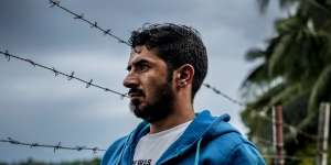 Behnam Satah,a Kurdish refugee,on Manus Island. The allegations of crimes against humanity,including torture,deportation,persecution,and other inhumane acts,stem from Australia's post-9/11 policy toward asylum-seekers known as the'Pacific Solution'.