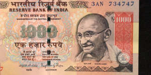 A 1000 rupee Indian currency note which is being withdrawn from midnight on Wednesday.