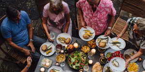 Worried about the cost of a dinner party? Consider making it a potluck event.