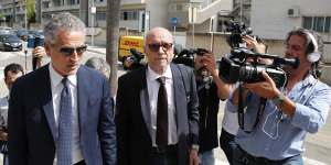 Canadian-born film director Paul Haggis,centre,arrives with his lawyer at Brindisi law court in southern Italy in June after he was arrested and accused of sexual assault which he denied.