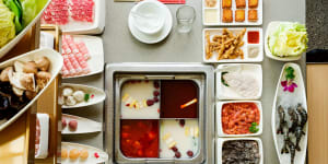 Haidilao's'quad flavour'hot pots are divided into four sections.