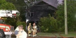 Brisbane house fire'suspicious'as woman,50,rallies in hospital