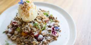 The brekkie crumble,a vibrant mix of fruit,oat,pistachio and cashew crumble and vanilla mascarpone.