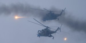 Military helicopters fly over the Osipovichi training ground in Belarus,on February 17.