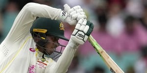 Khawaja left high and dry as rain forces Aussies to press for victory