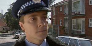 Warren Jones (Constable Paul Berry) in an E Street scene on Stephen Street,Balmain.