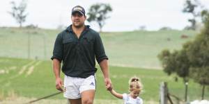 Brumbies hooker Josh Mann-Rea with his daughter Avery at home in Jugiong,NSW. 