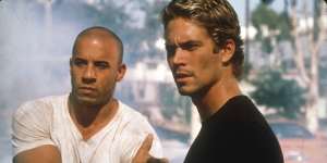 Vin Diesel and Paul Walker in the first Fast and Furious in 2001.