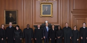 Joe Biden and Vice-President Kamala Harris (centre) with members of the Supreme Court in September,2022.
