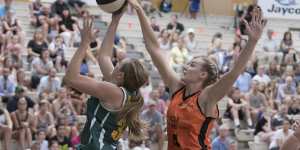 Darcee Garbin,right,playing for the Townsville Fire in the WNBL.