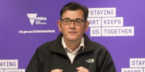 Premier Daniel Andrews in his North Face jacket on Monday. 