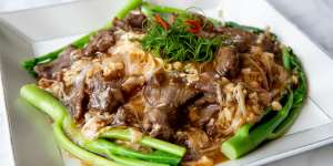 Wok-fried flat rice noodles with sliced wagyu,ginger,onion,bean sprouts and garlic. 