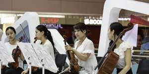 Endless ways to pass the time … a string quartet plays a live set at Incheon.