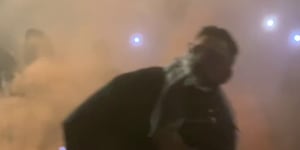 NSW Police have released footage of a man throwing a flare at the Opera House as they call out to members of the public to assist in giving information. 