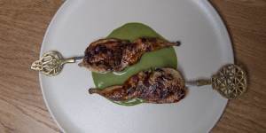 Quail skewers with barberry glaze and spinach-like molokhia.