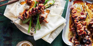 Char sui pork skewers with cucumber and sesame salad.