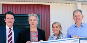 Bridget McKenzie delivering a sports grant with Forde LNP MP Bert Van Manen in August 2018