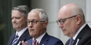 Prime Minister Malcolm Turnbull addresses the media during a joint press conference with Finance Minister Mathias Cormann and Attorney-General George Brandis on Tuesday. 