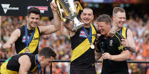 Damien Hardwick and his players with the 2019 premiership cup.