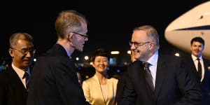 Australia’s Ambassador to China Graham Fletcher greets Australia’s Prime Minister Anthony Albanese after arriving at Hongqiao Airport,Shanghai in China,Saturday,November 4,2023.