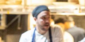 Comfortable booths and spotlit tables are spaced among heritage pylons. 