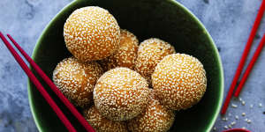These sweet,sticky sesame rice balls often roll around on yum cha trolleys.