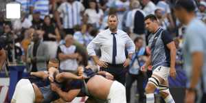 Argentina’s head coach Michael Cheika looks at his players warming up before the Rugby World Cup quarter-final match between Wales and Argentina.