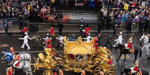 King Charles III and Queen Camilla travelling in the Gold State Coach,which was built in 1760. It has been used at every coronation since that of William IV in 1831. 