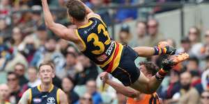 Brodie Smith was knocked out cold after taking this mark over Harry Perryman.