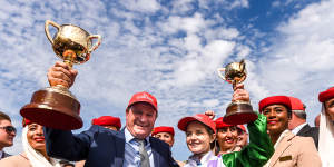Darren Weir and Michelle Payne after Prince Of Penzance won the 2015 Melbourne Cup.