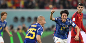 World Cup LIVE:Famous Japanese victory sends Germany packing,Spain advance