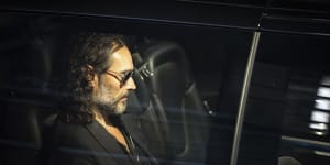 Russell Brand leaves a London theatre where he performed on September 16 after allegations emerged in The Sunday Times and on UK television.