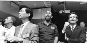Optus boss Bob Mansfield (r) breathes a mighty sigh of relief after the B3 successfully launches in 1994 after B2s failure.