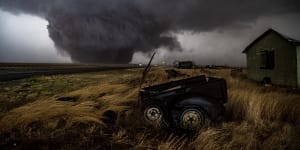 A wedge tornado grinds across the prairie land of the Texas Panhandle. Narrowly passing the town of Morton,the kilometre-wide twister did little damage except to drought-affected cotton fields.
