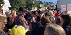 ‘Time to go Lammo’:Crowd rallies near Laming’s Qld office