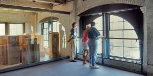 Clear glass encases the spot from where Oswald took aim,but visitors can stand at the window immediately adjacent to it..
