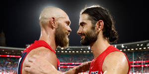 Former teammates,now foes:Max Gawn and Brodie Grundy embrace after the Swans’ season-opening win over Melbourne.