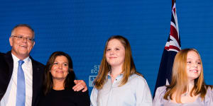 Scott Morrison and his family at the Brisbane Convention and Exhibition Centre on Sunday.